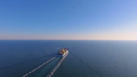 Aerial view of container ship floats in the ocean after loading in port of China Stock Footage 75454185