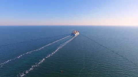 Aerial view of container ship floats in the ocean after loading in port of China Vidéo 75460676