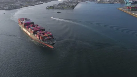 Aerial view of a container ship leaving the Port of Los Angeles Stock Footage 131102813