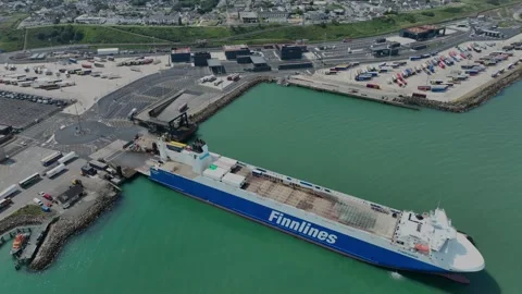 Aerial view of container ship loading at Rosslare Harbour Wexford Ireland land Stock Footage 340413952