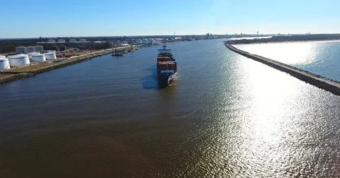 Aerial view of container ship in motion from the front - 1 Stock Footage 73926794