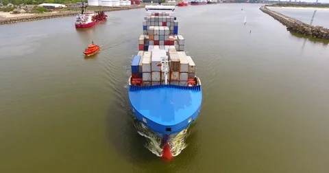 Aerial view of container ship in motion from the front - 10 Stock Footage 76277367