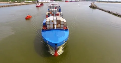 Aerial view of container ship in motion from the front - 11 Stock-Footage 76277775