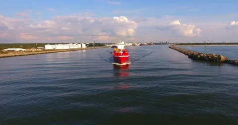 Aerial view of container ship in motion from the front - 22 Stock Footage 80218413