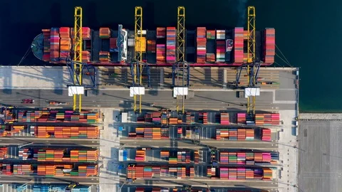 Aerial view. Container ship in pier with crane bridge carries out export and imp 스톡 동영상 106671177