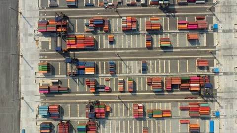 Aerial view. Container ship in pier with crane bridge carries out export  스톡 동영상 125681382
