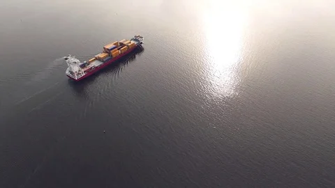 Aerial view of container ship sailing in the sea Stock Footage 74412252