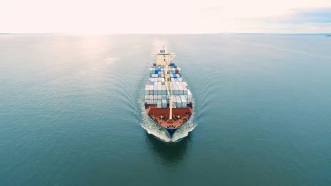 Aerial view of container ship sailing in sea Stock Footage 77721307