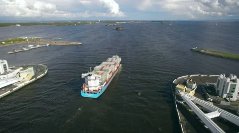 Aerial view of container ship sails to port Stock Footage 67216247