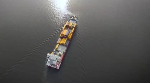 Aerial view of container ship in the sea Stock Footage 63556264