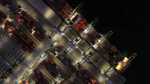 Aerial view. Container ships in the harbor with bridges Crane Operates export an Видео 107249377