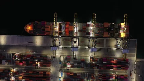 Aerial view. Container ships in the harbor with bridges Crane Operates export an Stock Footage 107249472