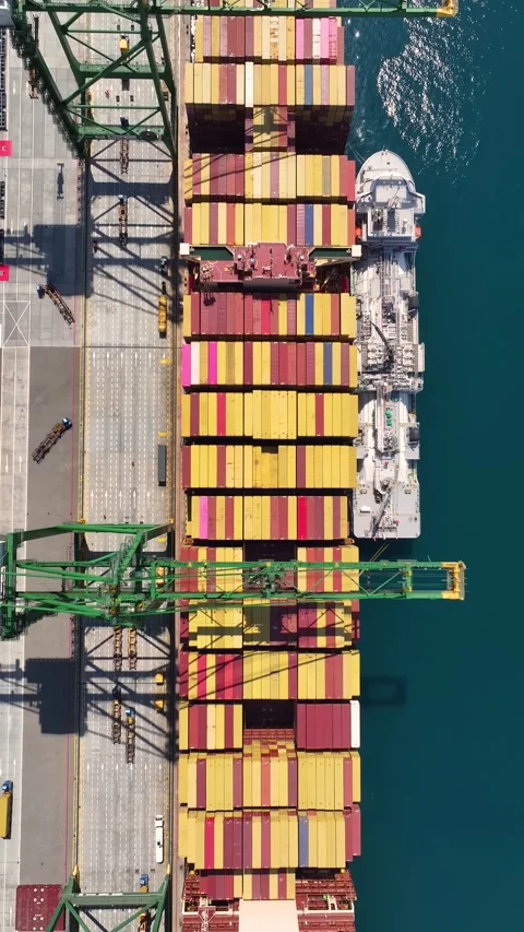 Aerial view of container terminal with shipping containers and cargo ship Stock Footage 340234605