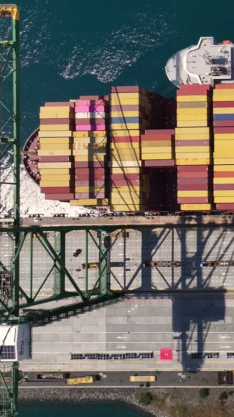 Aerial view of a container terminal with shipping containers and cargo ship Stock Footage 340234841