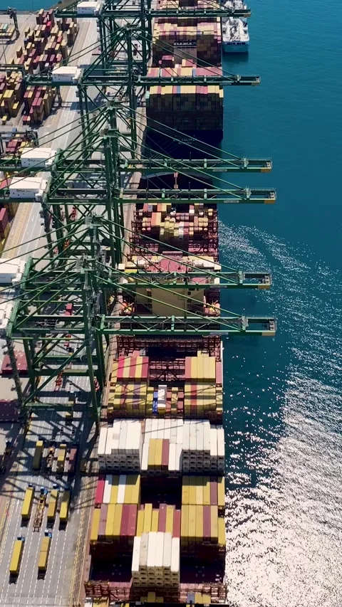 Aerial view of container terminal with shipping containers and cargo ship Stock Footage 340235478