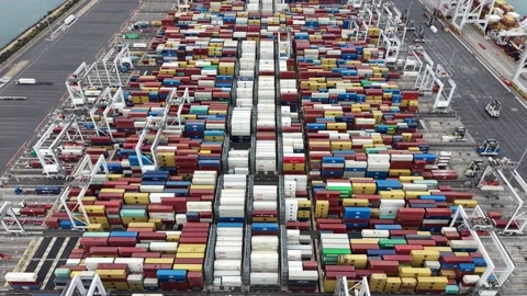 Aerial view of a container terminal unloading a ship Stock Footage 337811407