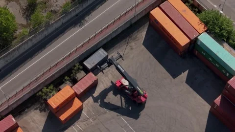 Aerial View Container Yard with Freight Equipment and Logistics Activity Stock Footage 343549491