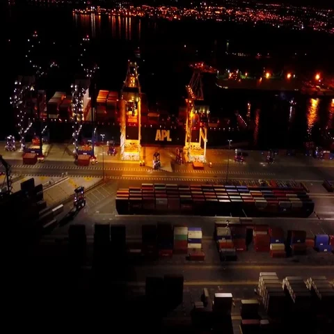 Aerial View Containers Cargo Ship at Night 4k Stock Footage 69717252