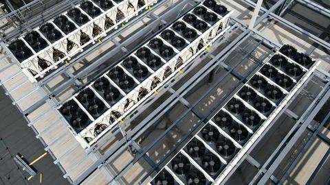Aerial view cooling units on data center rooftop Stock Photos
