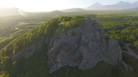 Aerial View. Copter flying over the cliff to the forest Stock Footage 73126741