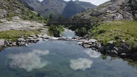 Aerial view of cornisello lake in the upper nambrone valley in trentino Stock Footage 247362797