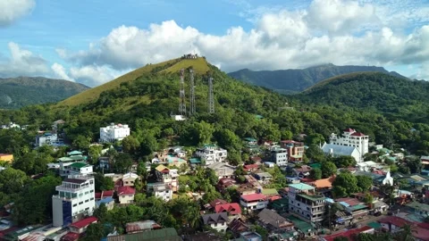 Aerial View of Coron Town Below Green Hills Vídeo Stock 335460632