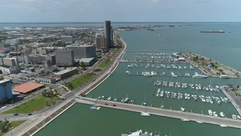 Aerial view of Corpus Christi seawall in Downtown Corpus Christi Stock Footage