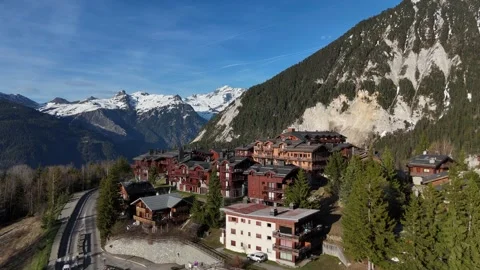 Aerial view of Courchevel Moriond 1650, with wooden chalets and hotels Stock Footage 334313402