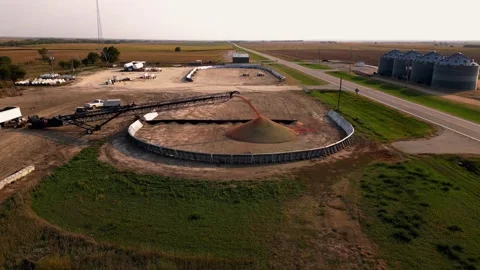 Aerial view of a covered grain ground pile at the Lebanon elevator Stock Footage 345532182