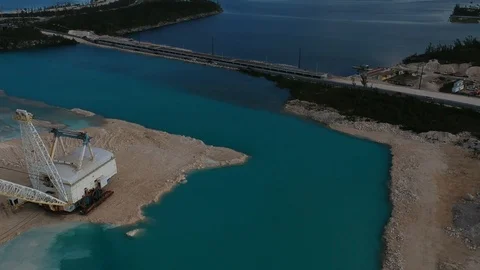 Aerial View of Crane Dredging Work at Fishing Hole Road, Grand Bahama Stock Footage 89654699