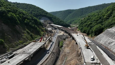 Aerial view of cranes and bridge foundation pillars on construction site 스톡 동영상 280607451
