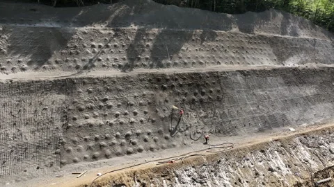 Aerial view of cranes and bridge foundation pillars on construction site Vídeo Stock 280654348