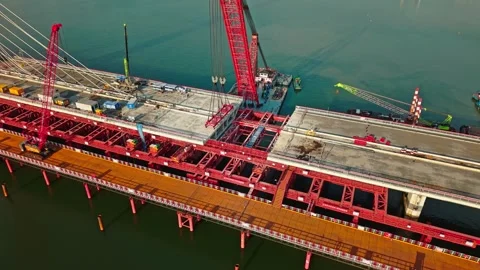 Aerial view of cranes and construction equipment are working to dismantle an old Video stock 325717634