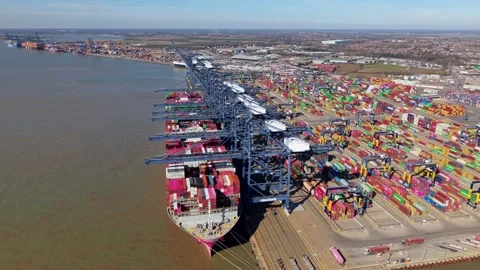 Aerial view of cranes and container ships, United Kingdom. Stock Footage 332068096