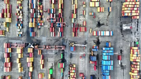 Aerial view of cranes and counters loading in port Stock Footage 241795595