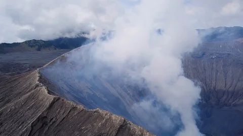 Aerial view. Crater with active volcano smoke in East Jawa Stock Footage
