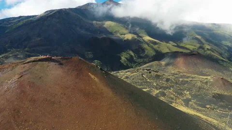 Aerial view of craters on the slopes of Mount Etna at Sicily Stock Footage 212047874