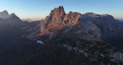 Aerial view of Croda da Lago and Lago Federa at sunset in the Dolomites Italy Видео 331968463