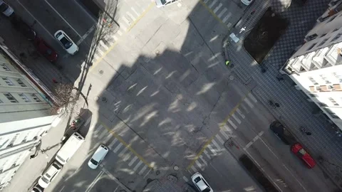 Aerial view of crosswalk and empty streets in quarantine days. sunlight seen thr Stock Footage 147976425