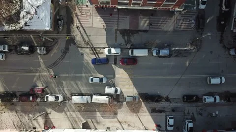 Aerial view of crosswalk and empty streets in quarantine days. sunlight seen thr Stock Footage 148654292