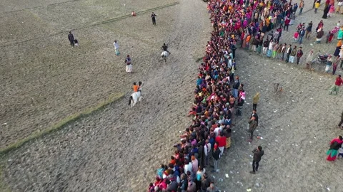Aerial view of a crowd and horses, Bangladesh. Stock Footage 315510260