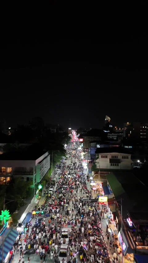 Aerial View of Crowd Celebrating Night Festival on City Street in Pattaya, Stock Footage 335843852