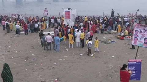 Aerial View of Crowd Leaving After Chhath Puja Festival at Yamuna River Stock Footage 332099337