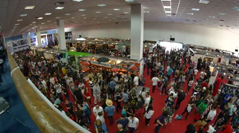 Aerial View Of The Crowded Main Hall Of A Big Convention, Fish Eye Video stock 64334516