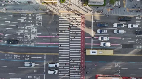 Aerial View of Crowds Crossing a Busy Crosswalk in Hongdae, Seoul, South Korea Stock Footage 346532383