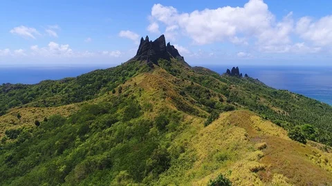 Aerial view of crown shape rock formation on Nuku Hiva island, Polynesia Stock Footage 90912706
