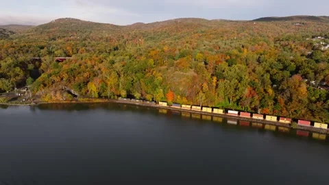 Aerial view of CSX train along Hudson River in New York, United States. Stock Footage 340866187