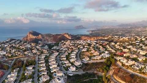 Aerial view of Cumbre del Sol residential development with winding roads 動画素材 337028456