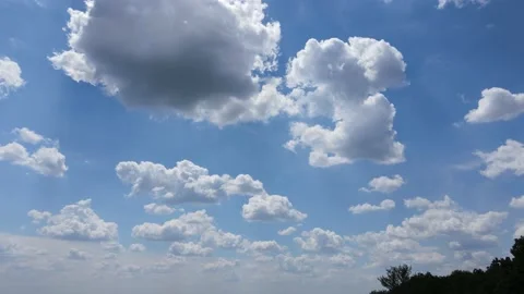 Aerial View of Cumulus Clouds. Descend to Trees -03 Stock Footage 154320133