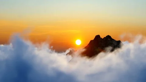 Aerial view of cumulus clouds. Sun lighten cumulus clouds under horizon Stock Footage 172292142